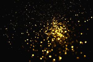 oro modello astratto glitter polvere di stelle scintillanti luci grunge sul nero. foto