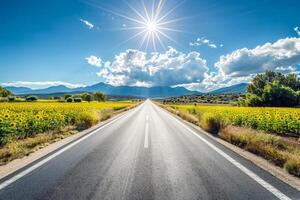 strada viaggio attraverso nazione strade, circondato di i campi di baciato dal sole colture nel il altezza di estate foto