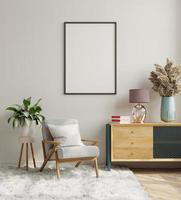 mock up poster nel design d'interni del soggiorno moderno con parete bianca vuota.
