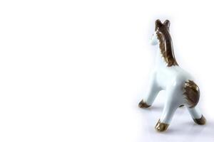 bianca ceramica figurina di un' cavallo foto