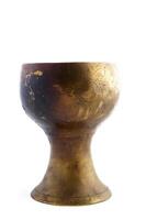 calice da vino in stile antico con bordo dorato foto