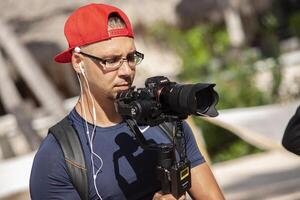 bayahibe domenicano repubblica 4 gennaio 2020 creatore nel azione con riflesso telecamera foto