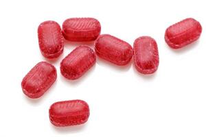 frutta rosso caramelle isolato su bianca sfondo 2 foto