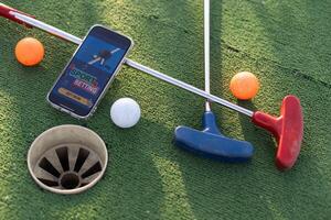 mini golf gli sport scommesse su un' smartphone foto