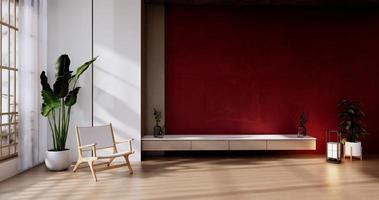 armadio in soggiorno con parete rossa e poltrona.3d rendering foto