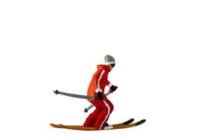 miniatura persone , un' sciatore pieno lunghezza isolato con ritaglio sentiero foto