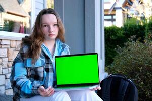 croma chiave verde schermo il computer portatile computer ragazza foto