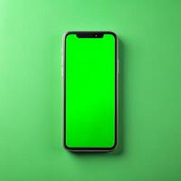 verde schermo su smartphone su un' verde sfondo foto