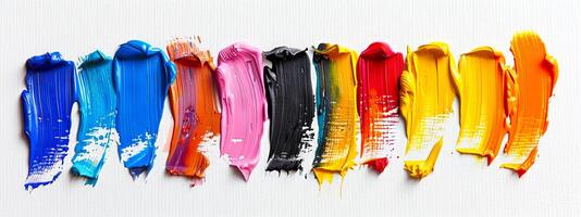 un' vivace spettro di multicolore dipingere colpi disposte nel un' riga. concetto di arte, creatività, astratto disegno, colorato espressione. colorato dipingere macchie isolato su bianca sfondo foto