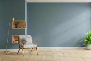 interno del soggiorno con poltrona su sfondo muro blu scuro vuoto. foto