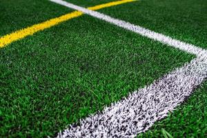 stadio del campo di calcio universitario o scolastico, sfondo di erba verde foto