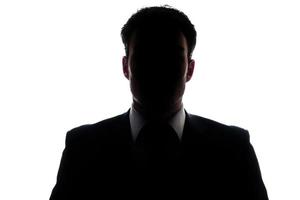 uomo misterioso in silhouette foto