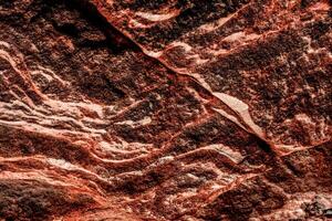 struttura di pietra marrone roccia isolata e vasta collezione di pietre di granito sfondo foto