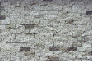 astratto muro quadrato in pietra grigia texture realistica ornamento edificio rock sulla natura.