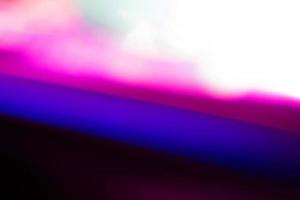 viola e blu sfocatura scintilla multicolore brillante astratto colorato su nero foto