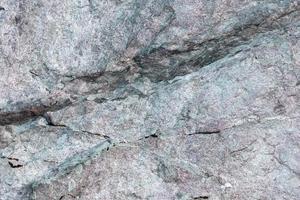 mattonelle della roccia del fondo di pietra con materiale astratto di struttura del modello di colore grigio e blu pallido per la carta da parati foto