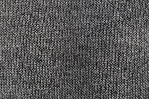 la superficie astratta del tessuto peloso in grigio per un motivo di sfondo. foto