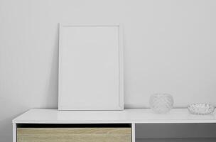 mockup di cornice minimalista sul cassetto della scrivania con sfondo bianco. decorazione a tema minimalismo per idee di interior design. foto