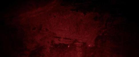 pareti rosso scuro spaventose, struttura di cemento di cemento leggermente scuro per lo sfondo foto