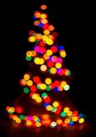 sfondo sfocato colorato multicolore e sfondo cerchio e cerchio astratto sfocatura effetto luci natalizie foto