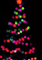sfondo sfocato colorato multicolore e sfondo cerchio e cerchio astratto sfocatura effetto luci natalizie foto