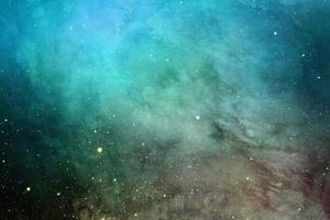 spazio drammatico colorato azzurro e grigio con galassie colorate e stelle per lo sfondo foto