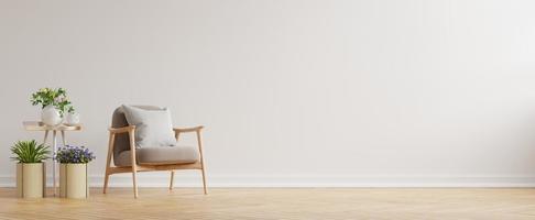 interni moderni e minimalisti con una poltrona su sfondo bianco vuoto della parete.