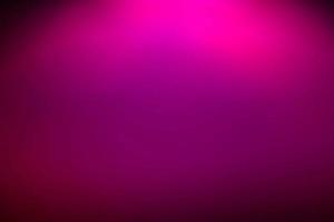 luce al neon rosa neon astratto luminoso riflesso lente colorato su sfondo nero.sfondo futuristico astratto scuro e neon foto