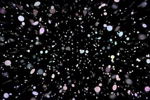 scintilla bianca astratta elegante effetto di luce su uno sfondo nero e scintilla particelle di polvere magiche scintillanti su nero foto