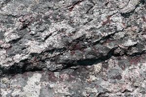 texture roccia grigia e nera le pietre nere grigio scuro sono tutte marmo e texture per la produzione di piastrelle foto