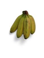 frutta isolata banana con fetta e foglie isolate e verdure di raccolta su un bianco foto