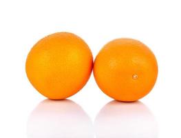 frutta arancione su sfondo bianco foto