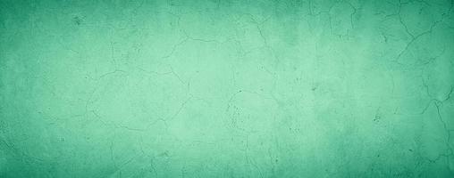 astratto grungy muro di cemento texture di sfondo con verde pastello color foto