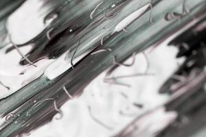 astratto bianco e grigio bellissimo marmo liquido fluido vernice acrilica texture vibrante. foto