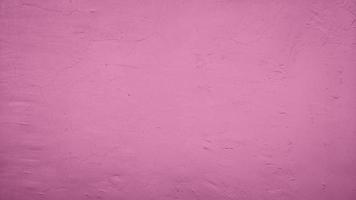 fondo astratto di struttura del muro di cemento del cemento con colore rosa foto