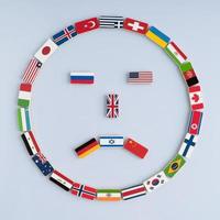 illustrazione di una faccina sorridente da bandiere nazionali su domino. concetto di pace e il Commonwealth delle nazioni e l'ordine mondiale foto