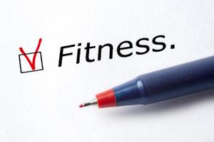 la parola fitness è stampata su uno sfondo bianco. foto