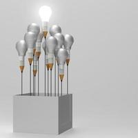 idea di disegno concetto di matita e lampadina fuori dagli schemi come concetto creativo e di leadership foto