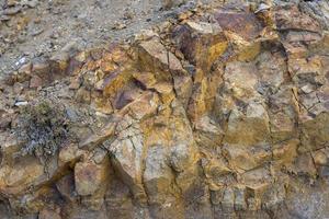 sfondo astratto di pietra arancione di roccia sull'isola di tenerife. foto