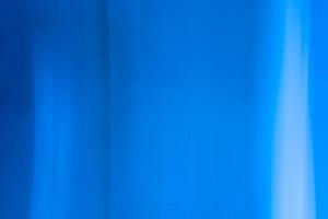 banner di sfondo astratto nei toni del blu con ombre, riflessi, linee verticali, onde. foto