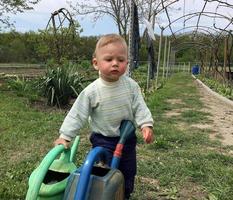 bellissimo bambino con la faccia da bambino in posa fotografo foto