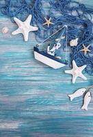 rete da pesca con decorazioni di stelle marine e mare foto