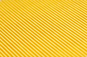 sfondo del primo piano da un tessuto con scanalatura di colore giallo foto