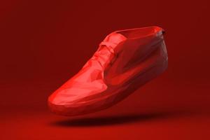 scarpa rossa fluttuante su sfondo rosso. idea di concetto minimale creativa. stile origami. rendering 3d. foto