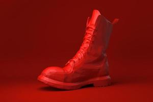 scarpa rossa fluttuante su sfondo rosso. idea di concetto minimale creativa. stile origami. rendering 3d. foto