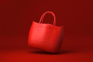 borsa rossa accessori moda donna galleggianti su sfondo rosso. idea di concetto minimale creativa. stile origami. rendering 3d. foto