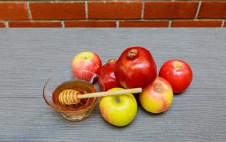 rosh hashanah miele, mela e melograno foto