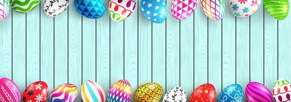 vettore di uova di Pasqua dipinte su sfondo di legno. decorazione di uova di Pasqua colorate su tavola di legno vista dall'alto con spazio di copia. uova di Pasqua con texture diverse.illustrazione vettoriale eps10 foto