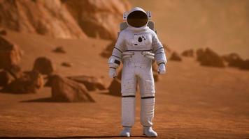 astronauta sulla superficie di Marte. pianeta rosso coperto di gas e roccia foto