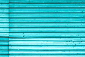 sfondo di struttura della tenda di ferro della parte anteriore del negozio di metallo di colore blu foto